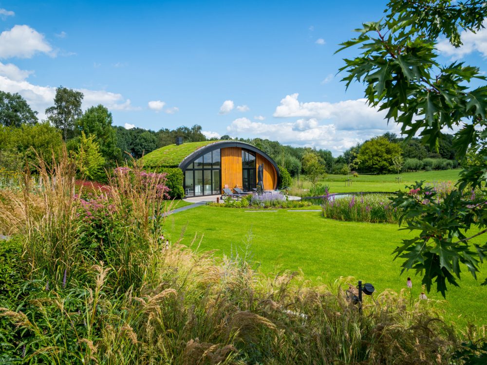 Grote tuin met buitenverblijf - Van Rosmalen Tuinen