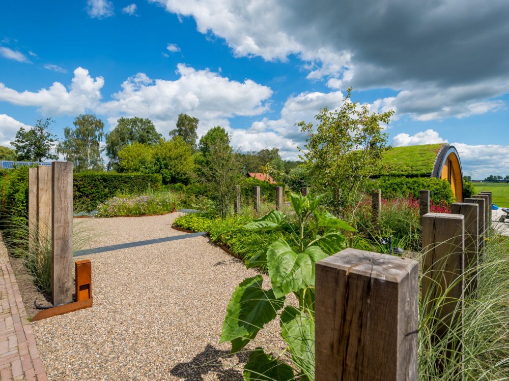 Grote tuin met buitenverblijf - Van Rosmalen Tuinen